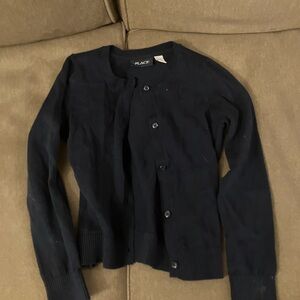 Navy blue children’s place sweater. This sweater is slightly worn and is size 7.
